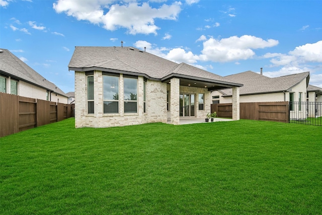 510 Rita Blanca Dr, Webster, TX 77598 - back of house featuring a patio, brick siding, and a shingled roof