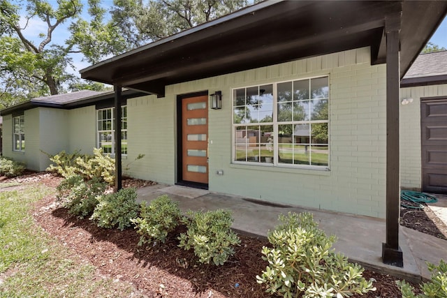240 Sleepy Hollow Dr, Lake Jackson, TX 77566 - doorway to property featuring brick siding