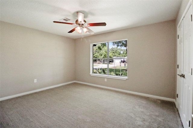 240 Sleepy Hollow Dr, Lake Jackson, TX 77566 - unfurnished room with carpet flooring, baseboards, and a ceiling fan