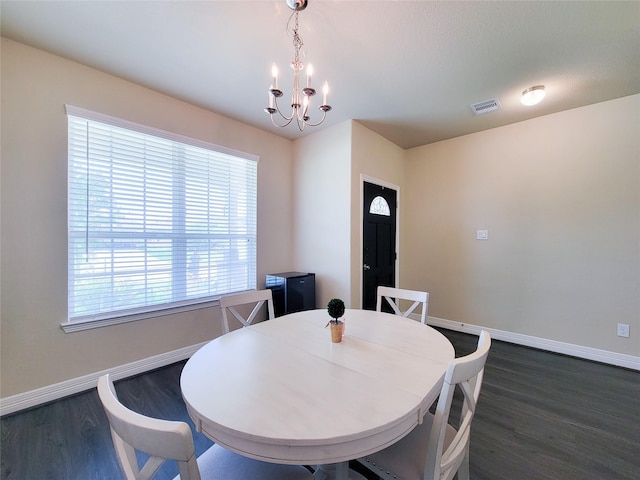 3430 Hughes Meadow Way, Richmond, TX 77406 - dining room with dark wood finished floors, baseboards, and a chandelier