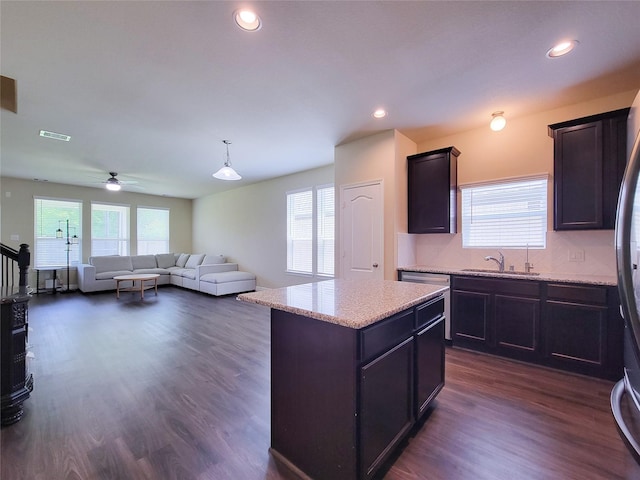 3430 Hughes Meadow Way, Richmond, TX 77406 - kitchen featuring a sink, ceiling fan, a kitchen island, dark wood-style floors, and recessed lighting