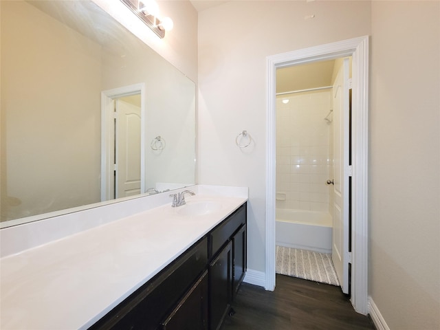 3430 Hughes Meadow Way, Richmond, TX 77406 - full bath featuring wood finished floors, vanity, baseboards, and  shower combination