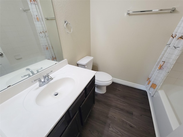 3430 Hughes Meadow Way, Richmond, TX 77406 - full bath with wood finished floors, toilet, vanity, shower / bath combination with curtain, and baseboards