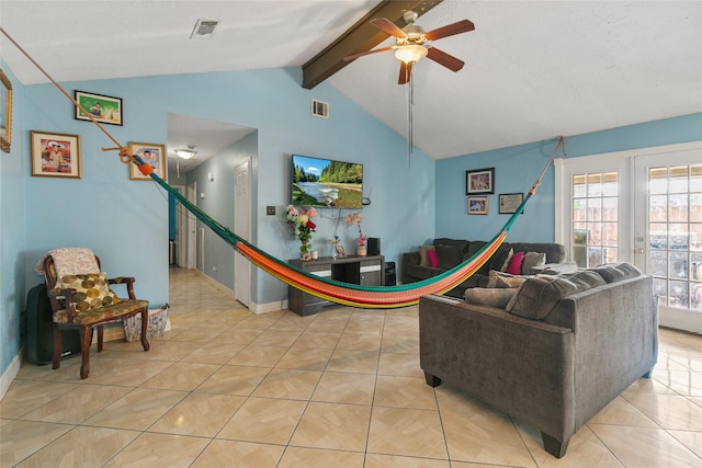 living room featuring a ceiling fan, light tile patterned floors, and baseboards