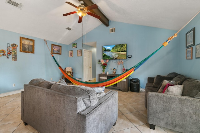 living room featuring ceiling fan, light tile patterned floors, and baseboards