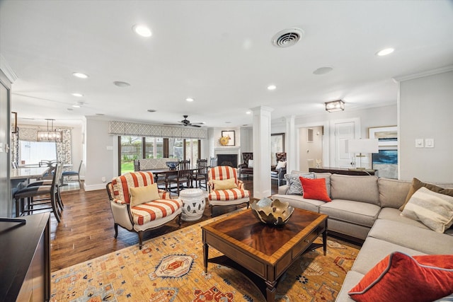 12310 Woodthorpe Ln, Houston, TX 77024 - living area with crown molding, recessed lighting, a ceiling fan, wood finished floors, and baseboards