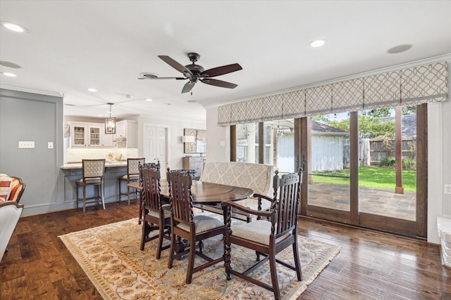 12310 Woodthorpe Ln, Houston, TX 77024 - dining area featuring crown molding, ceiling fan, recessed lighting, and dark wood finished floors