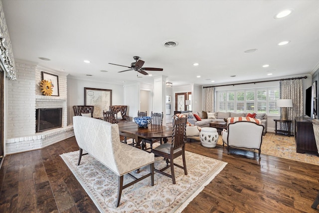 12310 Woodthorpe Ln, Houston, TX 77024 - dining space featuring ornamental molding, a fireplace, hardwood / wood-style floors, ceiling fan, and recessed lighting