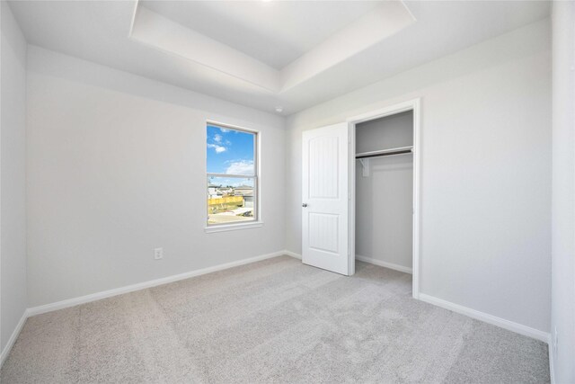 11765 Whirlaway Dr, Willis, TX 77318 - unfurnished bedroom featuring carpet floors and baseboards