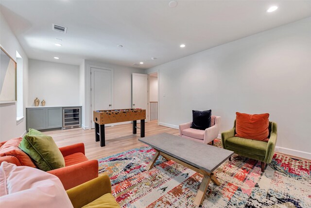 3314 La Salle St, Houston, TX 77027 - living room featuring beverage cooler, recessed lighting, and light wood finished floors