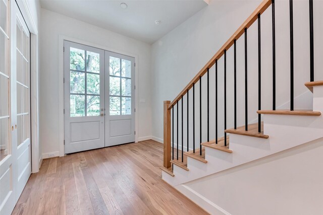 3314 La Salle St, Houston, TX 77027 - entryway featuring french doors, stairs, and hardwood / wood-style floors