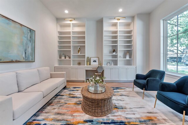 3314 La Salle St, Houston, TX 77027 - living room featuring healthy amount of natural light, light wood-style flooring, recessed lighting, and built in shelves