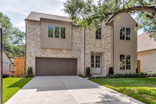3314 La Salle St, Houston, TX 77027 - view of front of home with concrete driveway, a garage, and brick siding