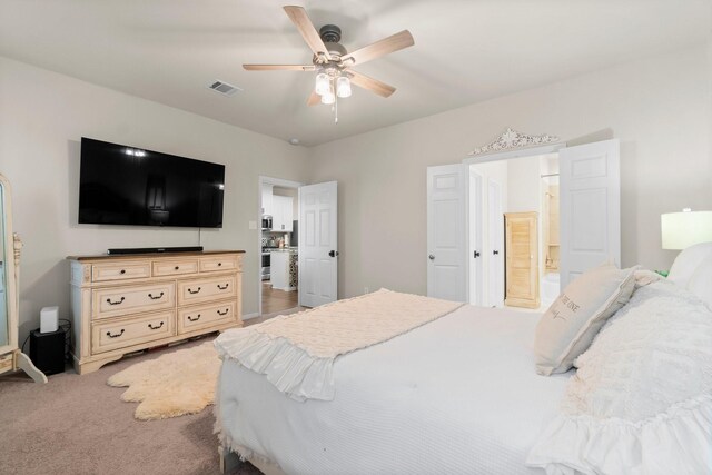 17723 Chartertree Ln, Tomball, TX 77377 - bedroom featuring ceiling fan, connected bathroom, and carpet