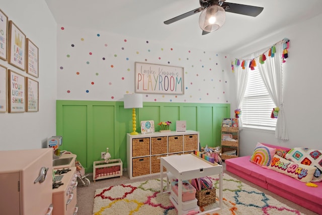 17723 Chartertree Ln, Tomball, TX 77377 - recreation room featuring ceiling fan, wainscoting, carpet flooring, and a decorative wall