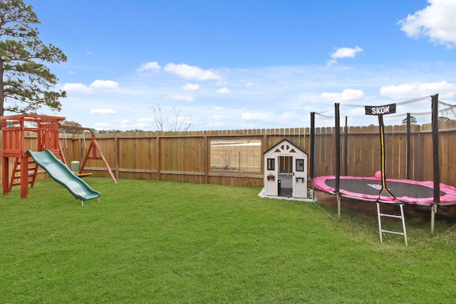 17723 Chartertree Ln, Tomball, TX 77377 - view of yard featuring a trampoline, a playground, and a shed