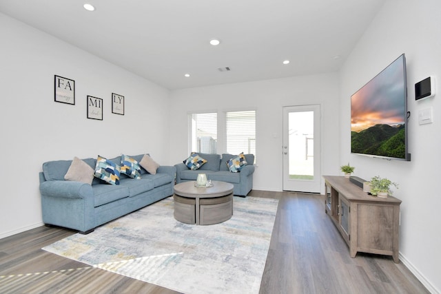 5227 Castlebury Meadows Dr, Spring, TX 77373 - living room with wood finished floors, recessed lighting, and baseboards