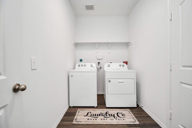 5227 Castlebury Meadows Dr, Spring, TX 77373 - clothes washing area with separate washer and dryer, dark wood-type flooring, and baseboards