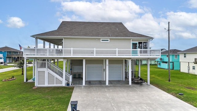 985 Sue Dr, Crystal Beach, TX 77650 - back of house with an attached garage, stairway, a yard, and a deck