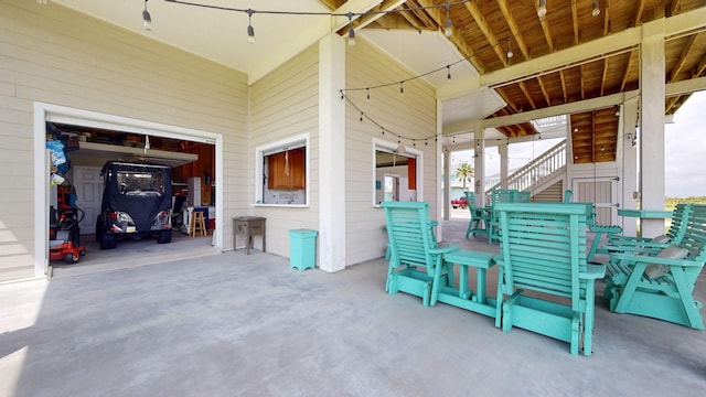 985 Sue Dr, Crystal Beach, TX 77650 - view of patio / terrace featuring stairway