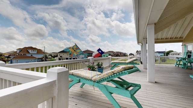 985 Sue Dr, Crystal Beach, TX 77650 - wooden deck with a residential view
