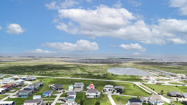 985 Sue Dr, Crystal Beach, TX 77650 - aerial perspective of suburban area featuring a nearby body of water