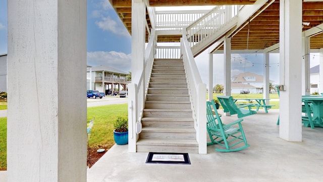 985 Sue Dr, Crystal Beach, TX 77650 - staircase with a residential view
