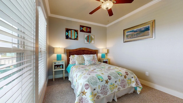 985 Sue Dr, Crystal Beach, TX 77650 - carpeted bedroom with ornamental molding, baseboards, and ceiling fan