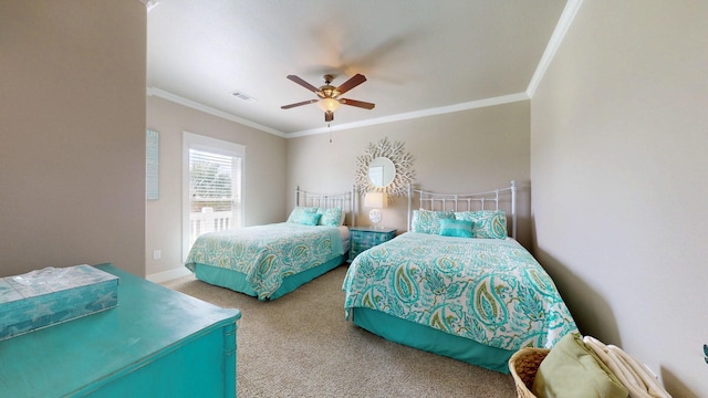 985 Sue Dr, Crystal Beach, TX 77650 - bedroom with carpet flooring, crown molding, ceiling fan, and baseboards