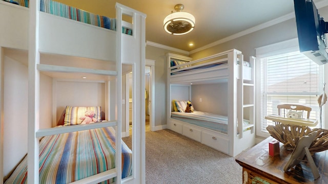 985 Sue Dr, Crystal Beach, TX 77650 - bedroom with light carpet and ornamental molding