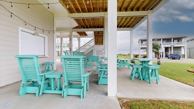 985 Sue Dr, Crystal Beach, TX 77650 - view of patio / terrace featuring stairs