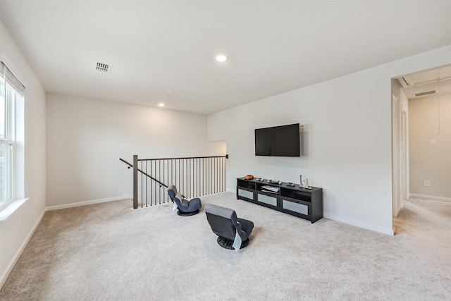 21606 Laggan Cliff Ln, Cypress, TX 77433 - unfurnished living room with carpet flooring, attic access, baseboards, and recessed lighting