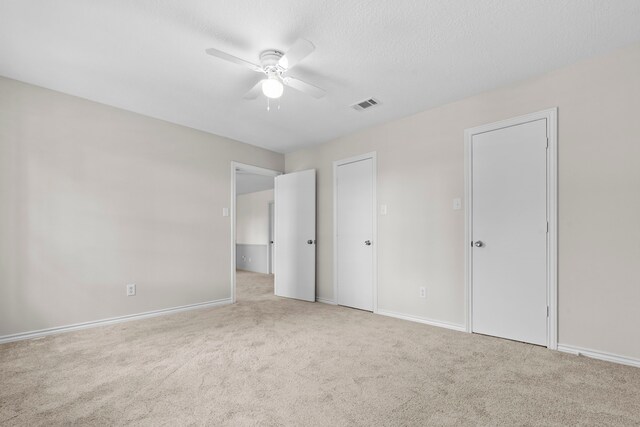 5310 Brownlee Ln, Spring, TX 77379 - unfurnished bedroom with carpet flooring, baseboards, and ceiling fan