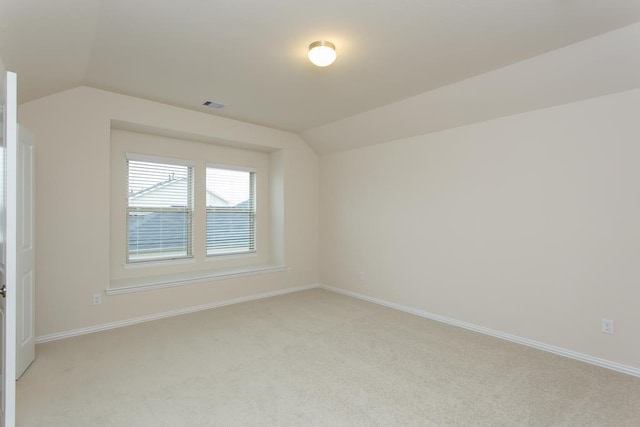 1626 Summer City Dr, Houston, TX 77047 - additional living space featuring vaulted ceiling, light colored carpet, and baseboards