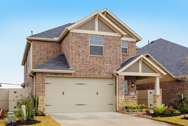 1626 Summer City Dr, Houston, TX 77047 - view of front facade with driveway, a shingled roof, stone siding, and brick siding