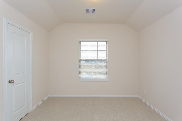 1626 Summer City Dr, Houston, TX 77047 - unfurnished bedroom with light colored carpet, baseboards, and vaulted ceiling
