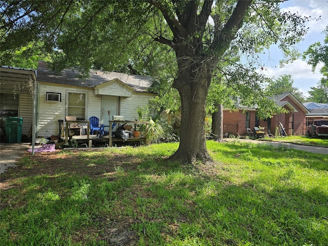 view of yard with a wooden deck