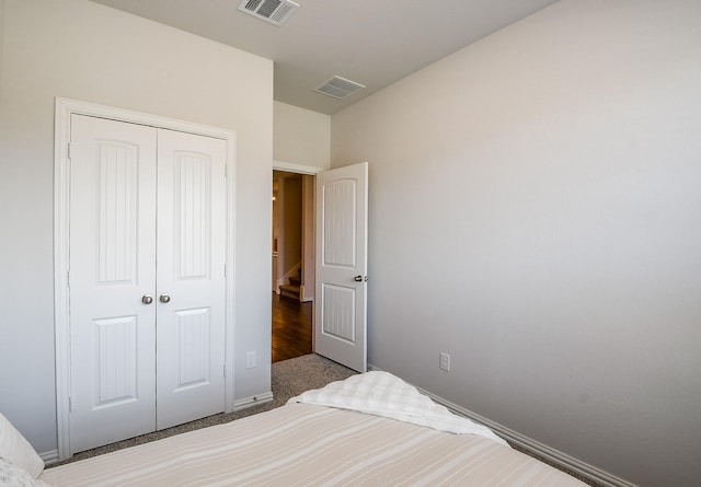 209 Cambria Green Ln, Katy, TX 77493 - carpeted bedroom featuring a closet and baseboards