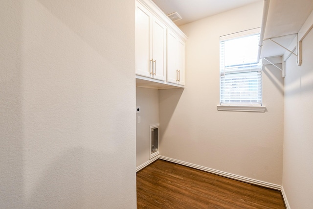 209 Cambria Green Ln, Katy, TX 77493 - washroom featuring cabinet space, hookup for an electric dryer, dark wood finished floors, and baseboards