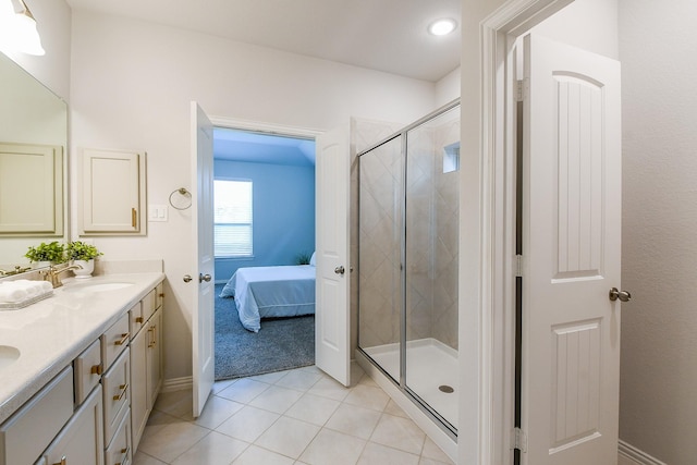 209 Cambria Green Ln, Katy, TX 77493 - full bath with a stall shower, double vanity, tile patterned floors, ensuite bath, and baseboards