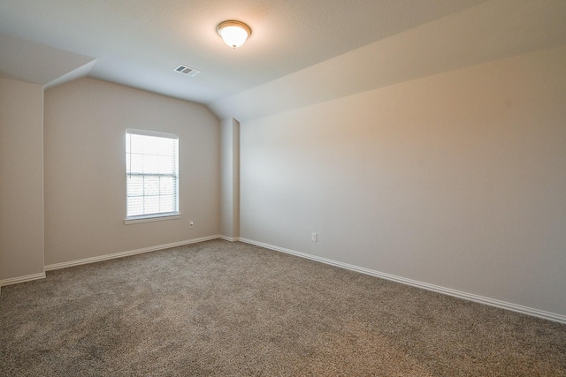 209 Cambria Green Ln, Katy, TX 77493 - carpeted empty room with vaulted ceiling and baseboards