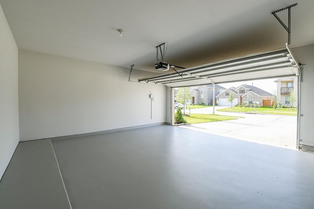 209 Cambria Green Ln, Katy, TX 77493 - garage featuring a garage door opener