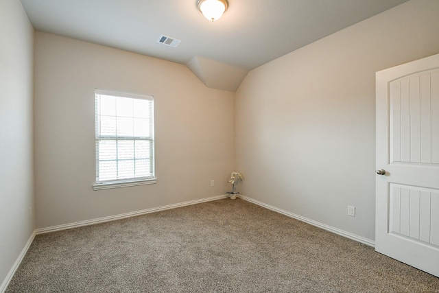 209 Cambria Green Ln, Katy, TX 77493 - carpeted empty room featuring baseboards and vaulted ceiling