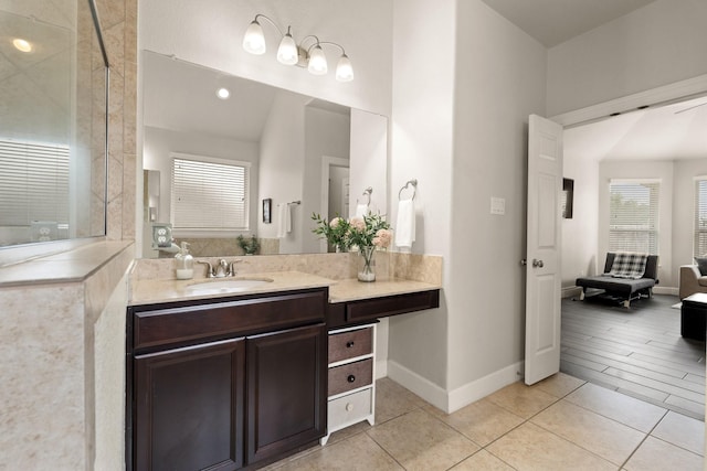 17222 Fable Springs Ln, Cypress, TX 77433 - bathroom with baseboards, tile patterned floors, vanity, and a shower