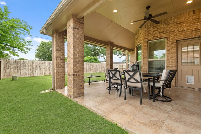 17222 Fable Springs Ln, Cypress, TX 77433 - view of patio featuring ceiling fan and outdoor dining area