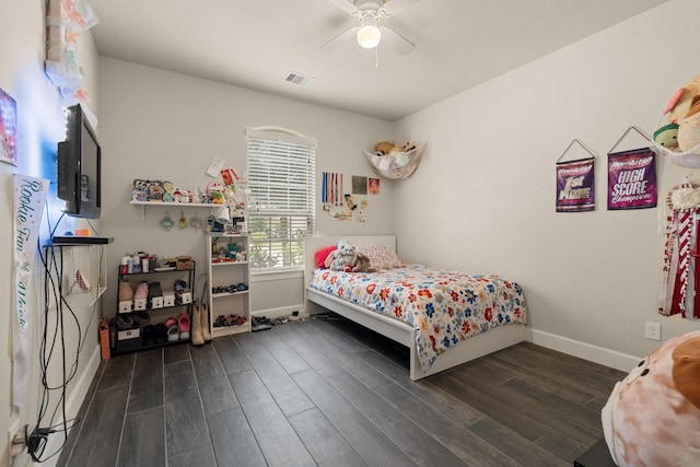 17222 Fable Springs Ln, Cypress, TX 77433 - bedroom with baseboards, dark wood finished floors, and ceiling fan