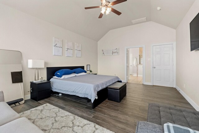 17222 Fable Springs Ln, Cypress, TX 77433 - bedroom with wood finished floors, baseboards, vaulted ceiling, and a ceiling fan