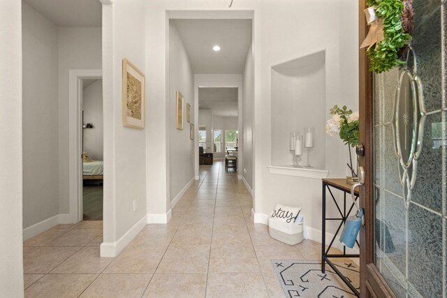 17222 Fable Springs Ln, Cypress, TX 77433 - corridor featuring light tile patterned floors and baseboards