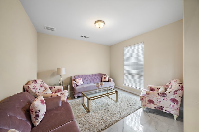 3627 Grand Promenade Ln, Stafford, TX 77477 - living room featuring baseboards and marble finish flooring