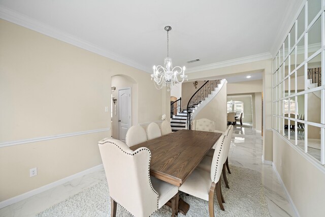 3627 Grand Promenade Ln, Stafford, TX 77477 - dining room featuring light marble finish floors, a chandelier, stairs, crown molding, and arched walkways